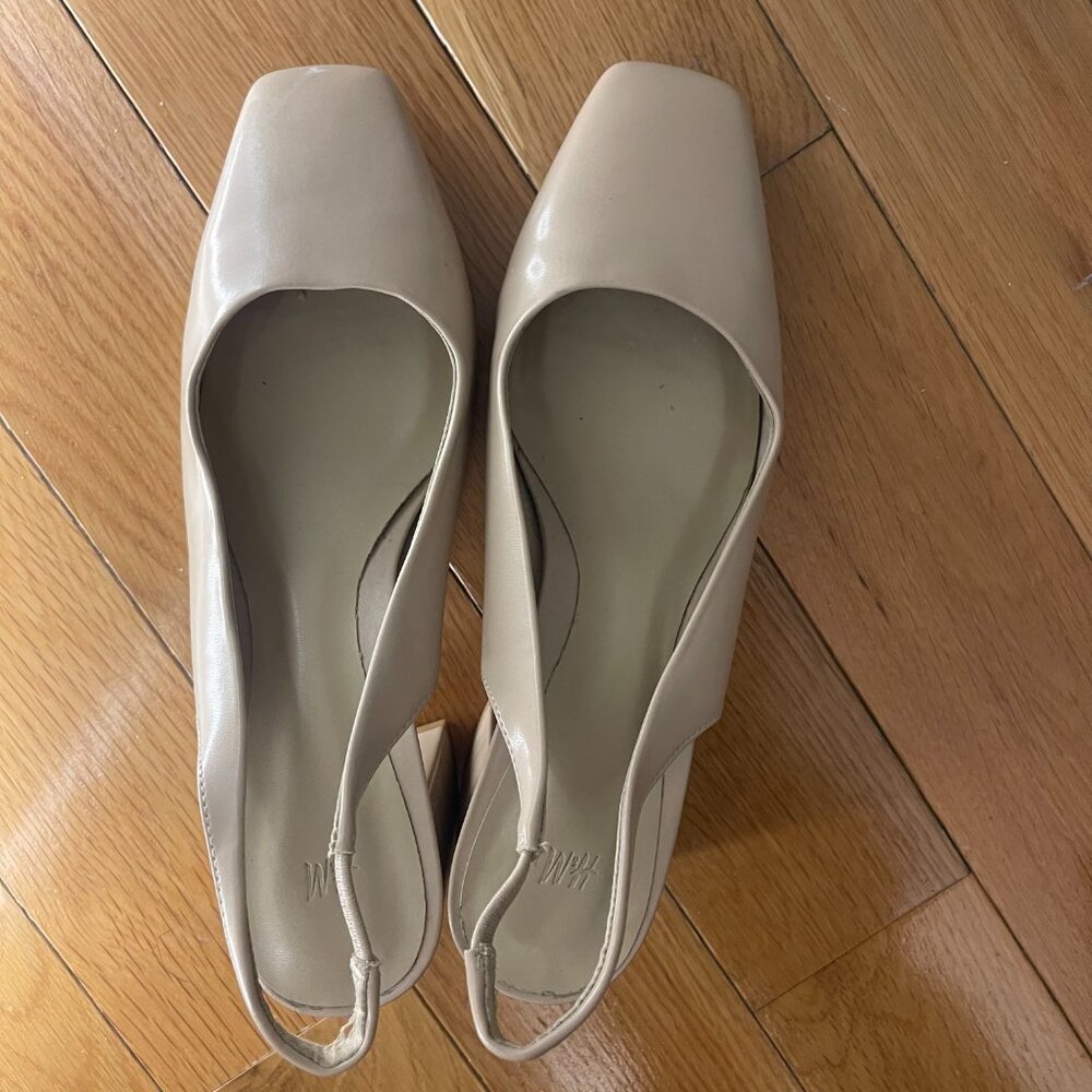 A perfect pair of beige heeled sandals